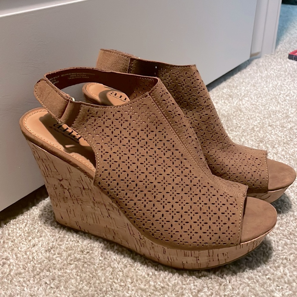 Tan laser cut detail wedge bootie with cork detail on heal